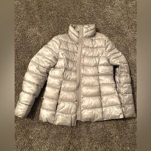 Silver puffer coat. Via Spiga size L